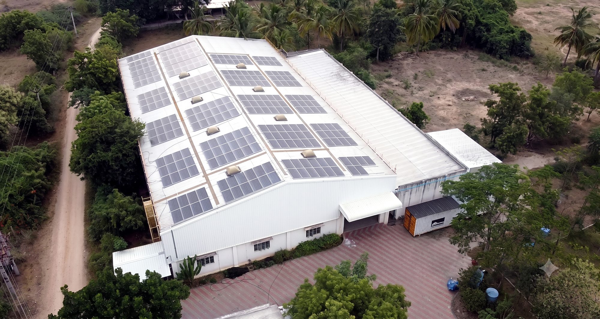 Aerial view of the Greendrops Techlife weaving facility in Coimbatore with rooftop solar